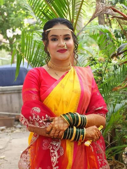 My beautiful Maharashtrian navri. I love the classic combination of a yellow and red saree, paired with a subtle yet glowing makeup look and traditional jewellery.