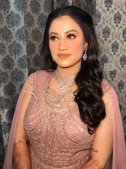A final portrait of the reception bride, her layered diamond necklace being the star of her accessories.