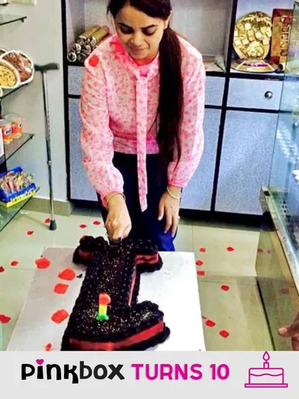 Celebrating our first anniversary. Looking back, it's amazing to see how far we've come. This picture is a reminder of the innocence and courage we started with, driven by a simple love for creating sweet things.