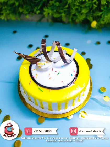 Another view of my vibrant yellow cake, perfect for bringing a bit of sunshine to any party. The simple decorations make it a versatile choice.