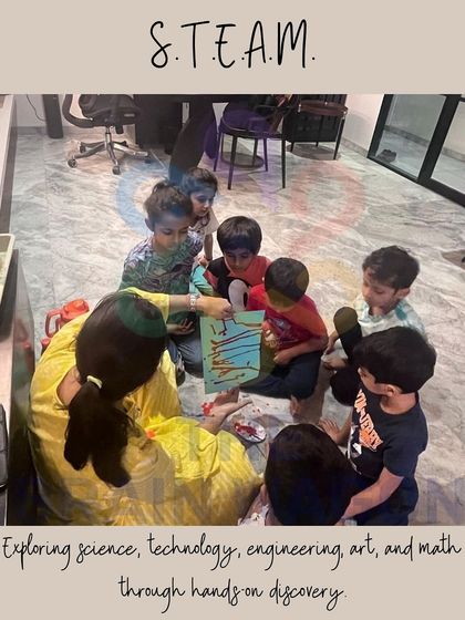 Exploring science, technology, engineering, art, and math through hands-on discovery. Here, children are working together on a STEAM project, learning through collaboration and experimentation.