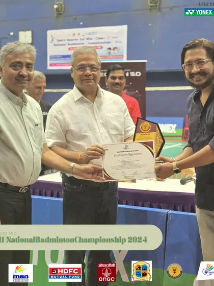 Our esteemed Chief Guests honoring a key member of the tournament management team. This public appreciation motivates my team to deliver their best at every event.