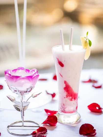 Chill out and beat the heat with our refreshing summer sips. This beautiful pink and white layered drink is a glass of pure bliss, designed to help you escape the scorching sun.