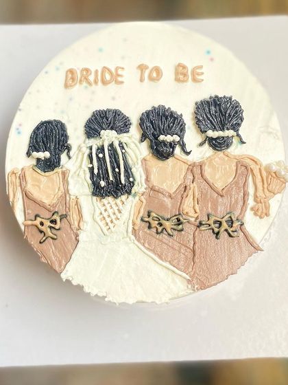 A beautiful example of our portrait art on a cake, done entirely with whipped cream. This one is for a bride and her bridesmaids.