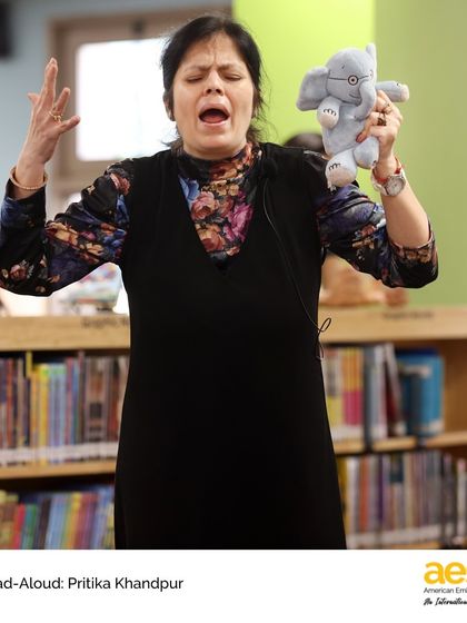 Guest storyteller Pritika Khandpur uses a puppet to engage her young audience. We partner with local artists and experts to provide rich and diverse learning experiences for our students.