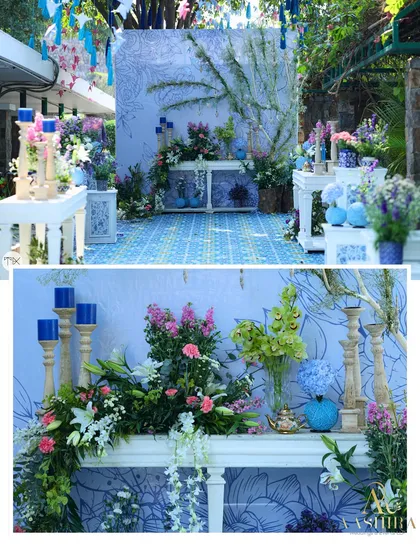 A collage showing the whimsical entrance with its hand-illustrated backdrop, origami bird ceiling, and consoles styled with pastel flowers and blue candles.