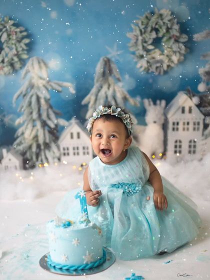 A big, happy shout for turning one! This little girl's excitement during her winter wonderland cake smash was so infectious and fun to photograph.