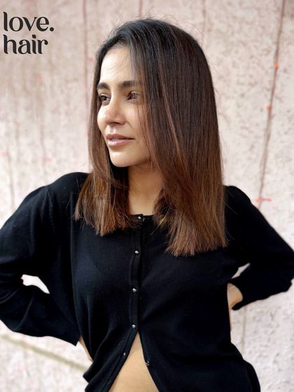 A lux brunette look on a chic, short haircut. This non-bleach colour adds richness and shine, proving that balayage isn't just for long hair.