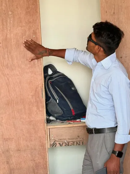 Inspecting the quality of the plywood being used for a wardrobe. I ensure we use high-quality materials in all our projects.
