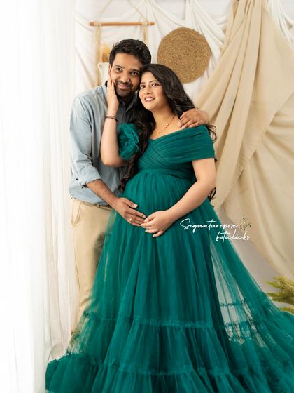 A warm and loving portrait of a couple in our boho studio, capturing their close bond.