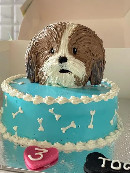 A stunning 3D Shih Tzu cake for Togo's 3rd birthday. We can create intricate, sculpted cakes for a truly one-of-a-kind celebration.