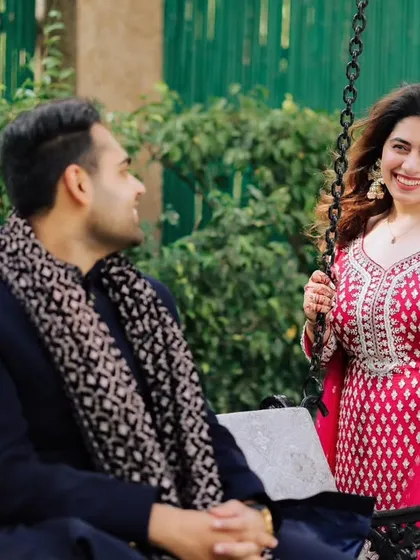 A sweet, candid shot of the couple on a swing during their Roka celebration. It’s these lighthearted, fun moments that really bring out a couple's personality.