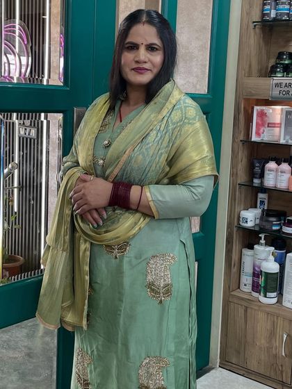 A mother-daughter duo getting ready at our salon. We provided age-appropriate, elegant makeup for both of them for their special family function.