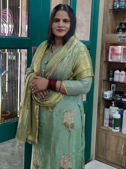 A mother-daughter duo getting ready at our salon. We provided age-appropriate, elegant makeup for both of them for their special family function.