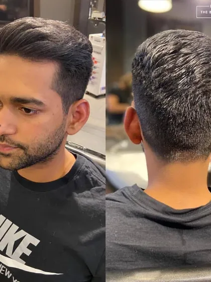 A classic men's haircut with a gentle taper fade. This front and back view shows the complete, well-rounded style that looks great from every angle.