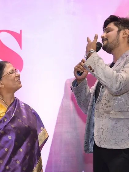 A moment of song and celebration with guests on stage. I am not afraid to be playful and use my personality to create a festive atmosphere.