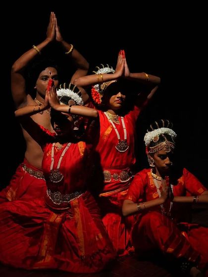 A concluding pose from a group performance with my senior disciples. This moment of stillness and gratitude is how we honor the stage, the audience, and the art form.
