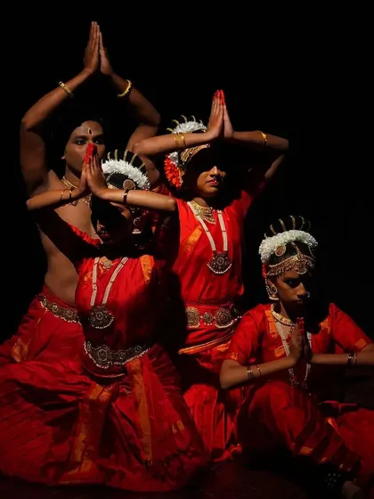 A concluding pose from a group performance with my senior disciples. This moment of stillness and gratitude is how we honor the stage, the audience, and the art form.