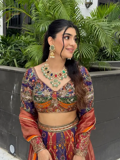 A side profile showcasing the beautiful hairstyle and the radiant glow of her skin.