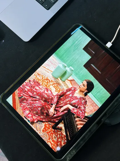 The post-production process. Reviewing selects and edits on my tablet to make sure the final images are perfect.