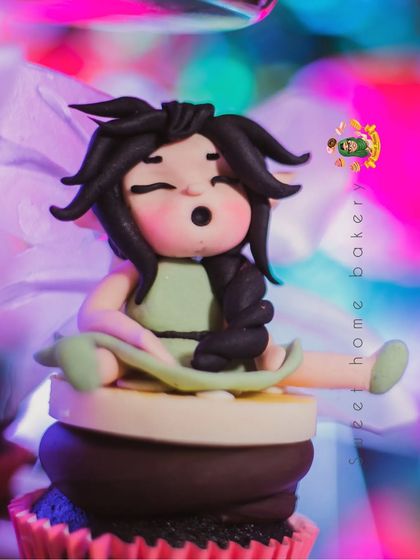 Another adorable fairy topper, this one with a playful, singing expression. I love giving each figurine its own personality.