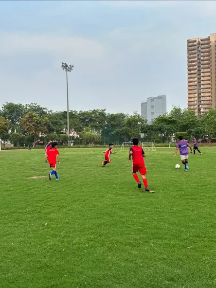 Our team on the attack during a day game on our home pitch. We train our players to be aggressive and always look for the goal.