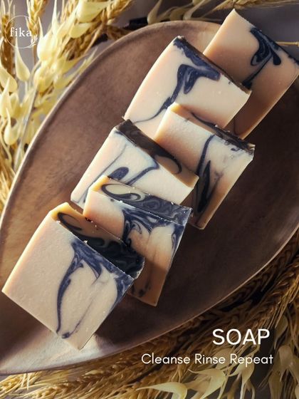 A close-up of my Triple Butter Bars. The beautiful black and white swirls are created with activated charcoal, while the base is packed with three nourishing butters for an ultra-creamy lather.