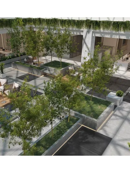 An aerial view rendering of the central biophilic courtyard at Hamdard Laboratories. The design integrates green spaces, water features, and informal seating directly into the office floor plan, making nature and wellbeing accessible to everyone.