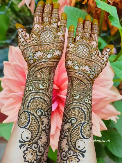 Inspired by the beauty of nature, this design features bold peacock motifs combined with delicate floral patterns and jaal work. A truly gorgeous design.