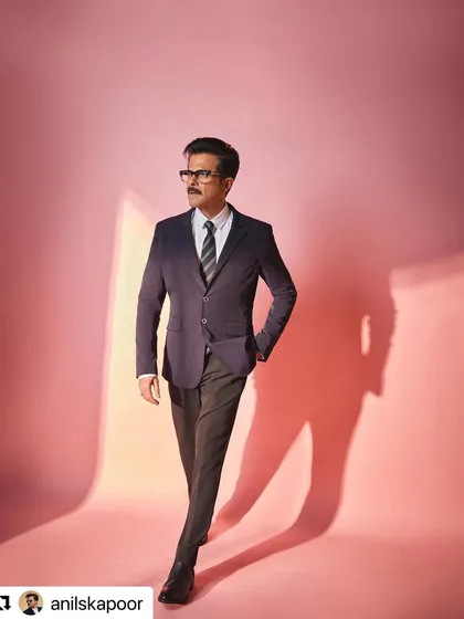 The full look for the event. The haircut adds to the sharp, tailored appearance.