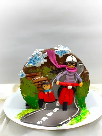 A top-forward cake for a mom who loves riding her scooter. The design captures a fun scene of her and her child on a ride.