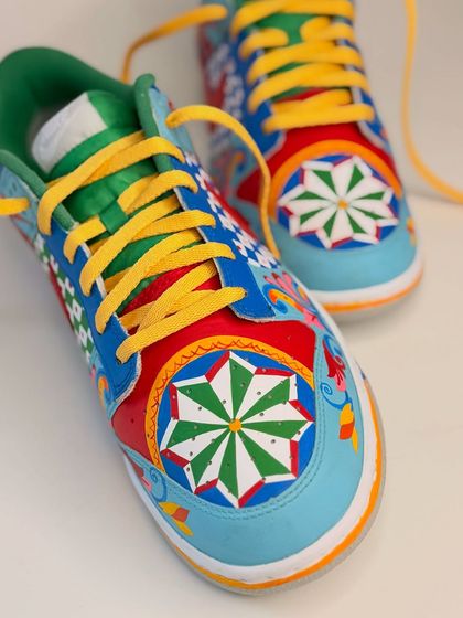 A detailed shot of the toe box. The geometric star pattern is a recurring theme in my Indian art pieces, and I love the precision it requires.