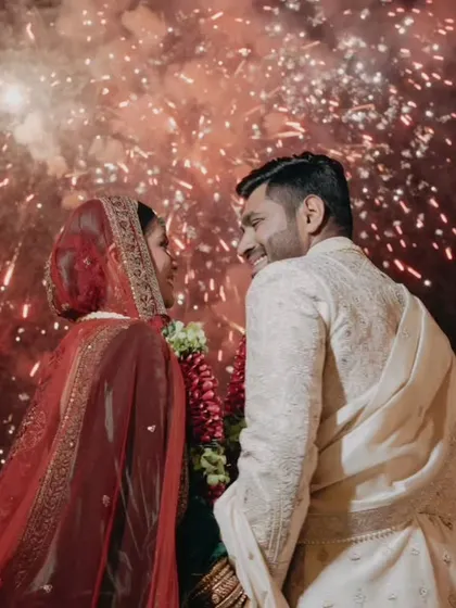 A moment of pure joy as fireworks erupt behind the couple. We believe in creating these spectacular, cinematic moments that become the most cherished memories of your wedding day.