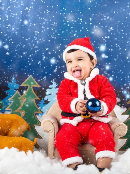 Another cheeky moment from a Christmas mini-session. This little Santa is full of personality.