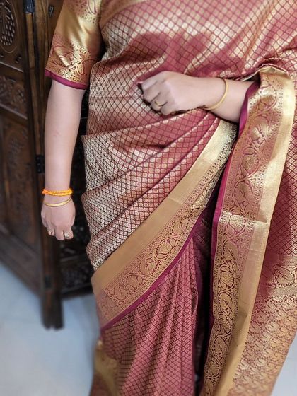 The hip pleat section of Aditi's self-draped saree, showing a neat and secure tuck.