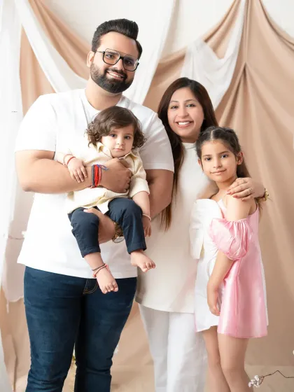 A beautiful studio family portrait capturing the warmth and joy of everyone together. I make sure to include parents and siblings in my sessions to create a complete and cherished family memory.