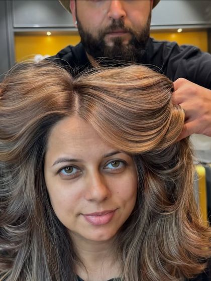 Another shot of the beautiful hair transformation, showing off the incredible volume and beautiful color blend.