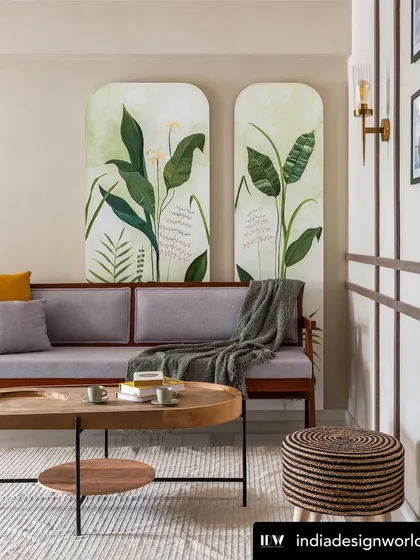 My hand-painted tropical wall panels featured in India Design World. The artwork serves as a vibrant, natural backdrop for the living room sofa, embodying the home's elegant and artistic spirit.