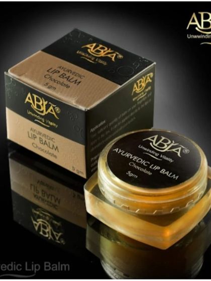 My Ayurvedic Lip Balm in Chocolate, a nourishing blend of ghee, beeswax, and coconut oil for naturally soft lips.