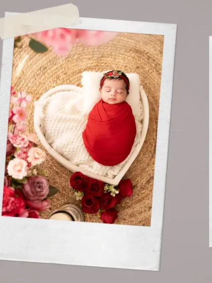 A newborn in a red swaddle rests in a heart-shaped basket, surrounded by roses. This setup is perfect for capturing the love that fills your home with a new baby.