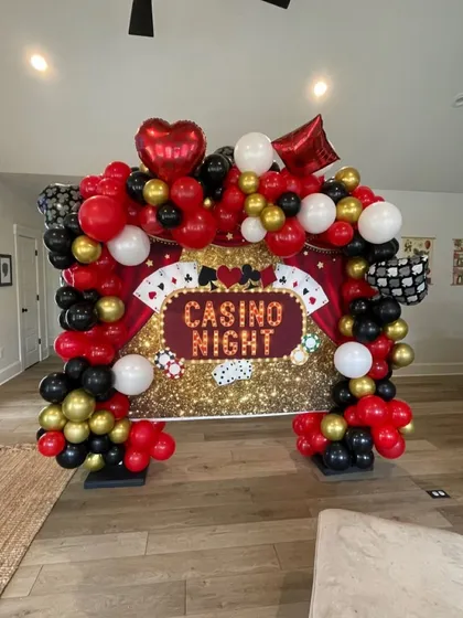 This fun 'Casino Night' backdrop is perfect for a house party. It's a self-contained unit that instantly sets a theme and creates a great spot for photos.