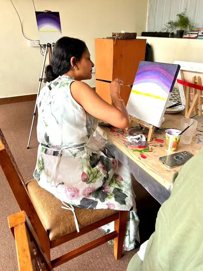 The beginning stages of a painting, with the background colors blended and ready for the next layer. Our instructors guide you step-by-step.