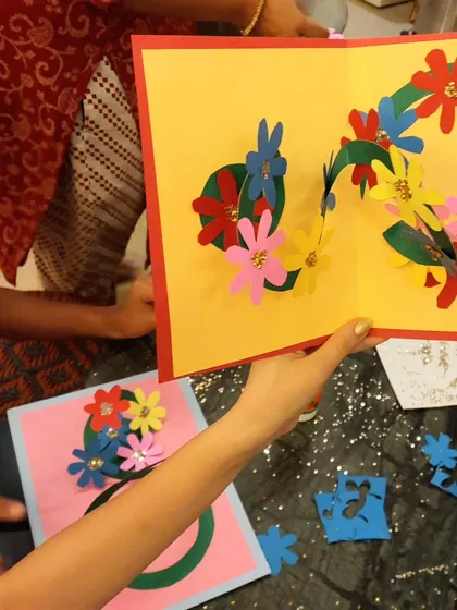 A colorful wreath of flowers inside a pop-up card. My students loved making these special gifts for Mother's Day.
