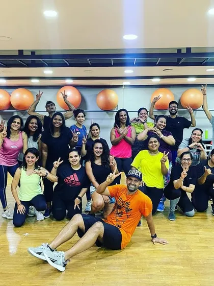 The Masterclass Tribe: A group photo with my amazing members after a dance fitness masterclass. The support and positivity in this community is everything.