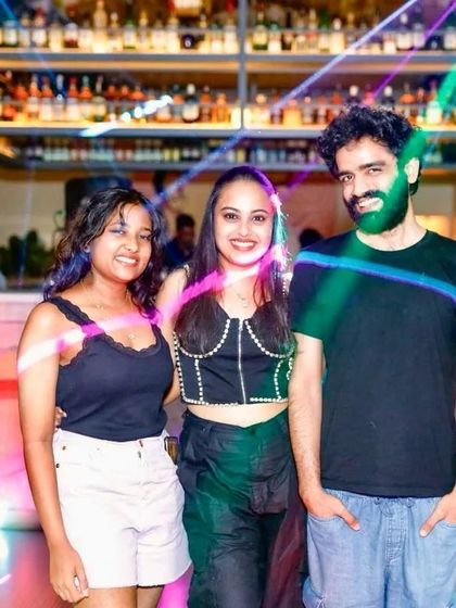 Guests enjoying the atmosphere during a High Heels Wednesday. The bar in the background is always busy on ladies' night.