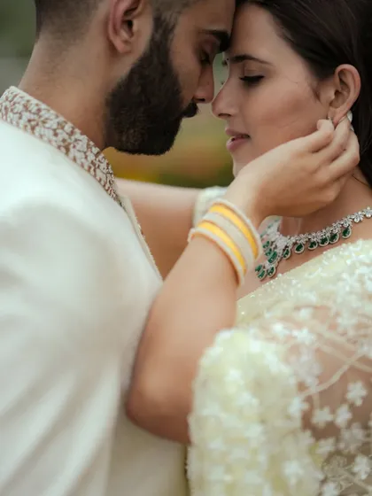 A close, intimate portrait capturing the deep connection between the couple. This shot from a Mumbai wedding shoot focuses on their gentle expressions and the soft, natural light, creating a timeless and emotional image.