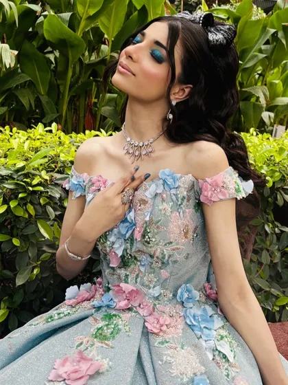 A full-on Barbiecore fantasy. This look is all about pinks, sparkles, and bold lashes.