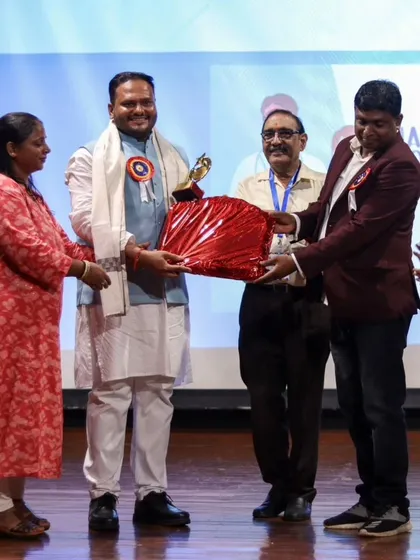 Receiving a token of appreciation at the Ayurveda Innovations Summit. I am grateful for the opportunity to share my knowledge with the next generation of practitioners.