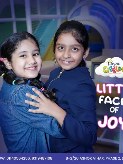 Little faces of joy! The genuine smiles on these two friends say it all. We love capturing these beautiful moments of friendship and happiness at House of Giggles.