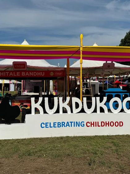The branded 'Kukdukoo' entrance sign I created for the Pune edition. These custom 3D letters are a popular feature I offer, providing a strong branding presence and a landmark for attendees.